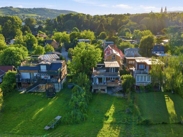 RARITÄT in erster Wasserreihe – charmantes Terrassenhaus mit freiem Donaublick 25 min von Wien!