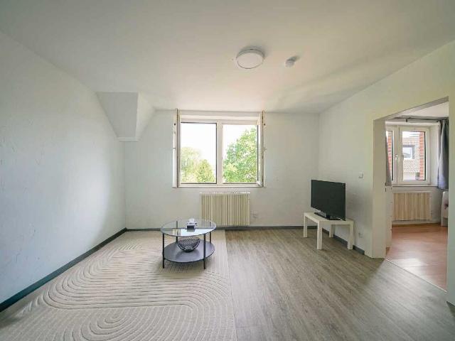 Ratingen Ost: Helle 2 Zimmer Wohnung mit Einbauküche und Gartenmitbenutzung