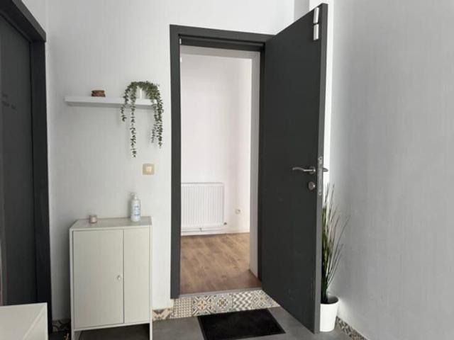 RDC de +/ 110m², séj avec cuis, 3 ch, SDB, 2WC et Buanderie