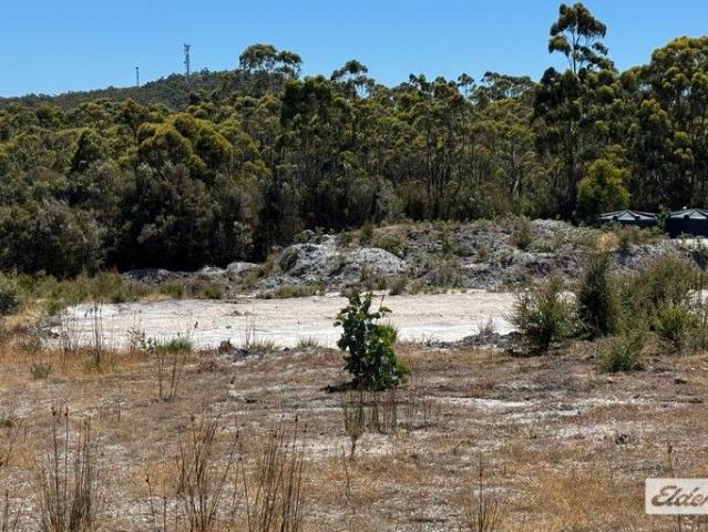 FRESH OPPORTUNITY ON OVER HALF AN ACRE PRIME LEVEL BUILDING BLOCK WITH HOUSE PLANS INCLUDED