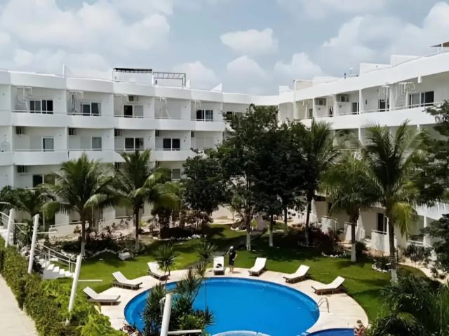 Remato departamento en suites cozumel. Sin posesión