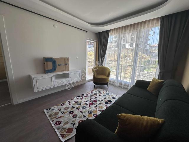 Remax Murat Toplu Konutta Sıfır Eşyalı 1+1 Kiralık Fırsat Daire