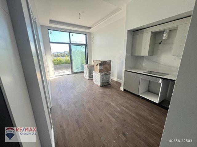 REMAX RAMAZAN'DAN GÜNEŞLİ VALORY SİTESİNDE BALKONLU 1+1 DAİRE