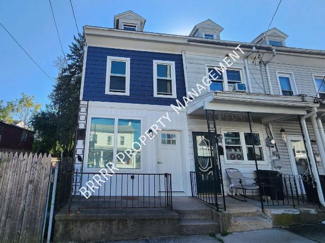 Remodeled end unit rowhome. 3 bedrooms, 1 bathroom and fenced yard