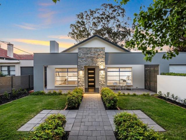 Remodelled bliss and boundless lawn, from a ornamental pear lined start to a sunset finish
