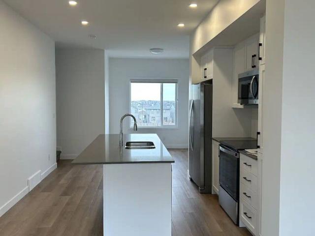 RENT REDUCED Beautiful Brand New Townhome in Airdrie SW — 3 Bedrooms Townhouse