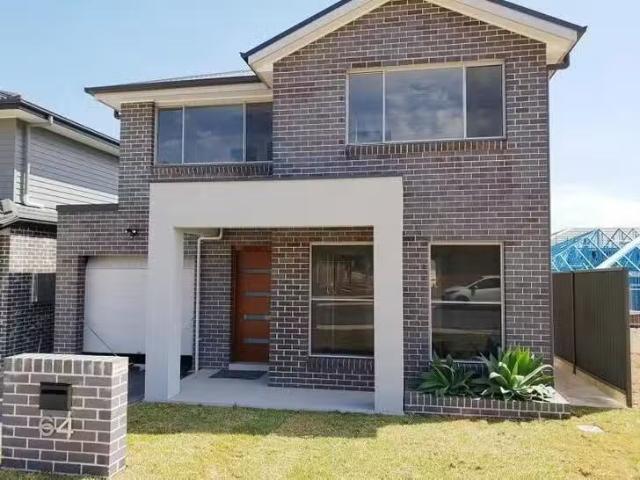 Just in! 4 BR 64 Maidenhair Avenue, Denham Court, NSW 2565