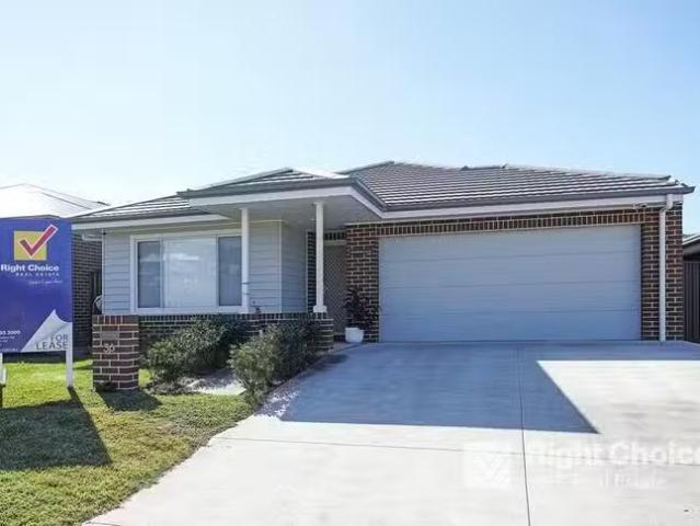 Rental! 4 BR 36 Sunflower Boulevard, Calderwood, NSW 2527