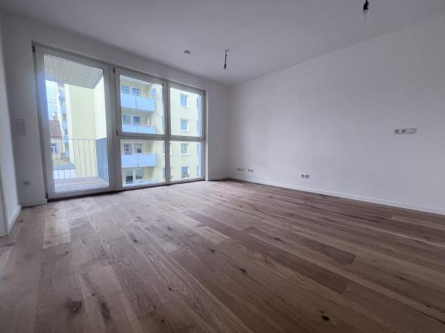Renditestarke Anlegerwohnung an der U1 | Erstbezug | hofseitiger Balkon