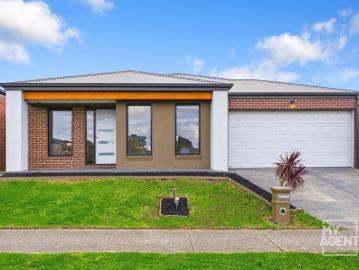 Renewed and refreshed 4 bedroom home with multiple living zones!