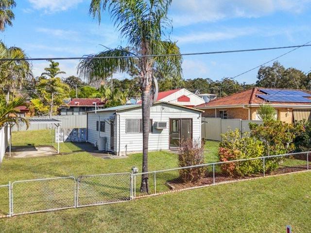 Renovate, Invest or Rebuild Endless Potential in a Prime Lakeside Location