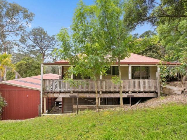 Renovate or rebuild on half an acre + huge garage