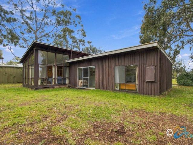 RENOVATE OR REBUILD DOUBLE BLOCK WITH THE LAKE JUST MOMENTS AWAY!