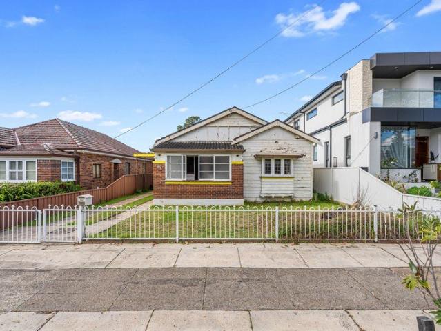 Renovate or Rebuild STCA with North Facing Backyard & Exceptional Potential