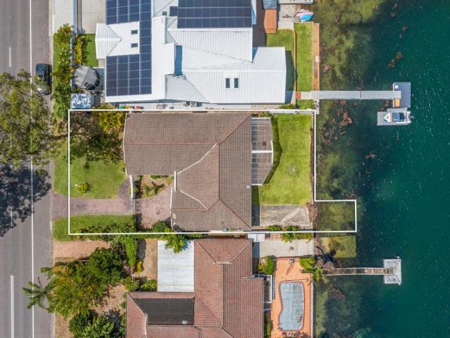 Renovate or Rebuild Wide Canal Full Width Waterfront