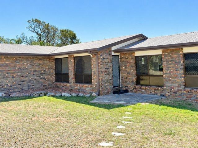 Renovated 4 bedroom home with a spacious fully fenced yard