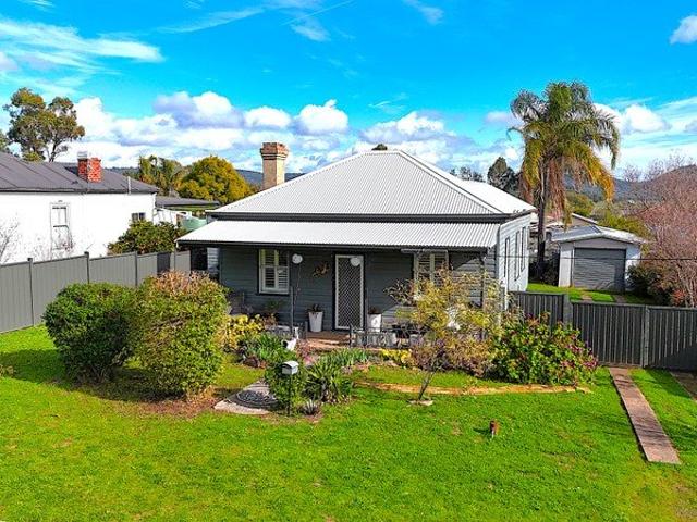 RENOVATED 4 BEDROOM WEATHER BOARD HOME