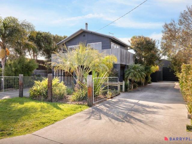 Renovated Coastal Charm with Studio Potential in Prime Location
