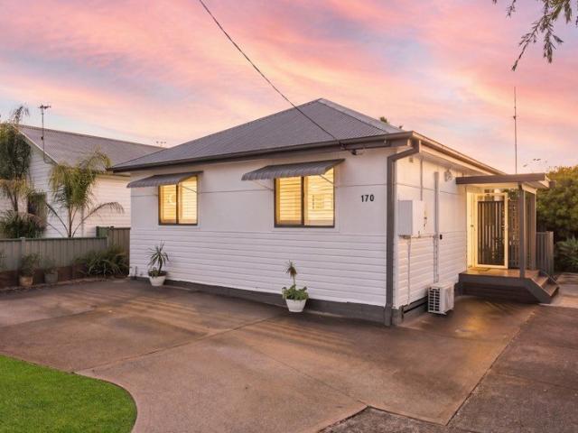 RENOVATED COASTAL LIFESTYLE WITH ENDLESS POTENTIAL