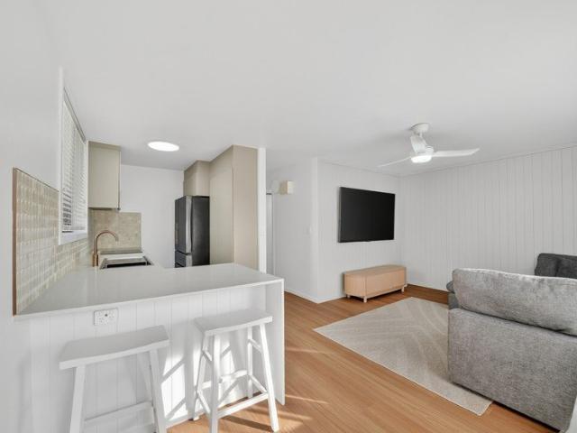 Renovated Coastal Living in Blue Chip Position