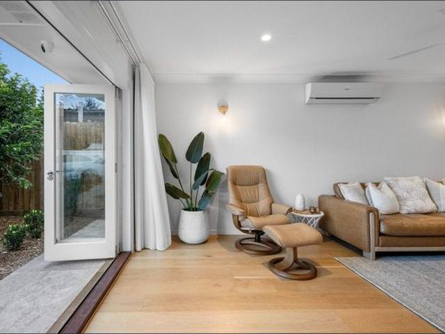 RENOVATED COASTAL RETREAT IN BURLEIGH'S EXCLUSIVE KOALA PARK