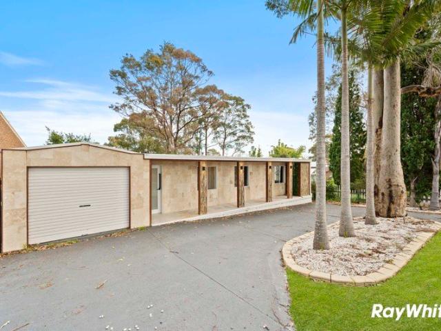 Renovated Coastal Retreat Just Moments from the Beach