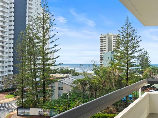 Vacant & Renovated Coastal Retreat with Ocean Views in Boutique Beachside Building