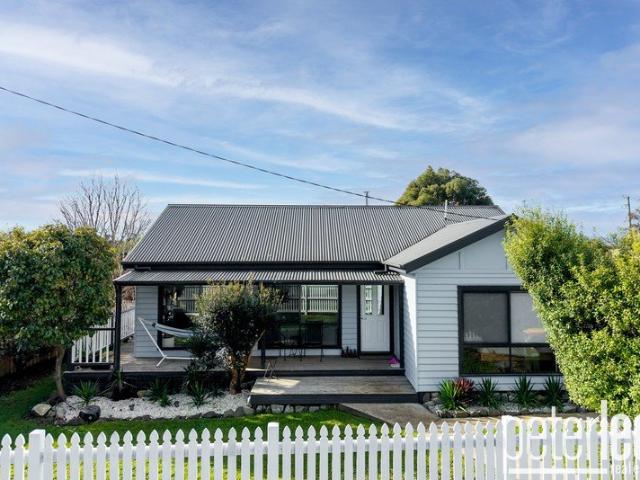 Renovated Comfort with Modern Style and Low Maintenance Living