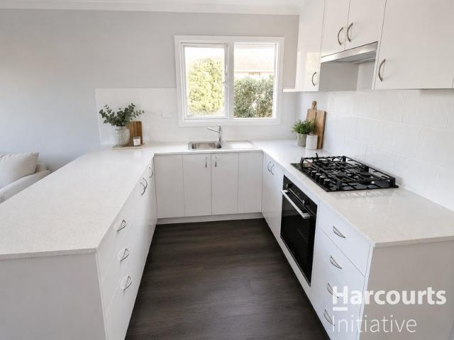 Renovated Corner Gem with Development Potential & Instant Rental Return