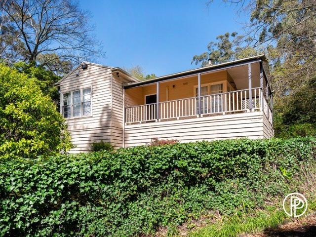 A HOME RICH WITH HISTORY AND CHARM IN A STANDOUT LOCATION