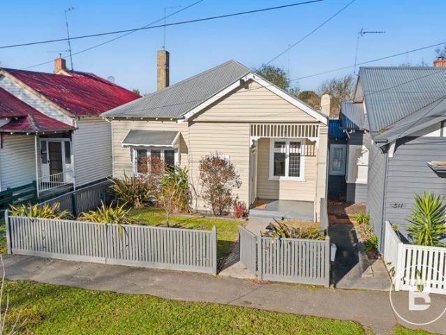 RENOVATED CHARACTER HOME IN TREE LINED SOLDIERS HILL