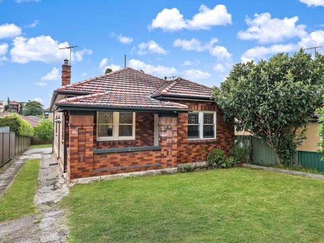 Renovated classic with north facing yard