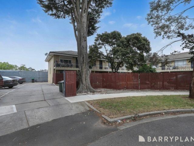 Renovated and Set to the quiet rear corner of a low rise block