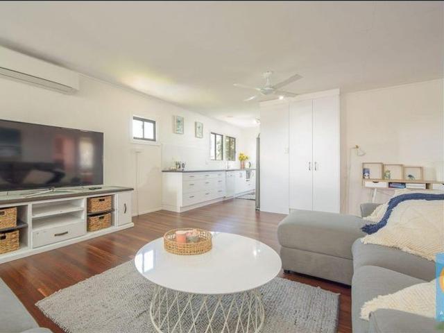 RENOVATED AIR CONDITIONED HIGH SET HOME IN A PERFECT LOCATION