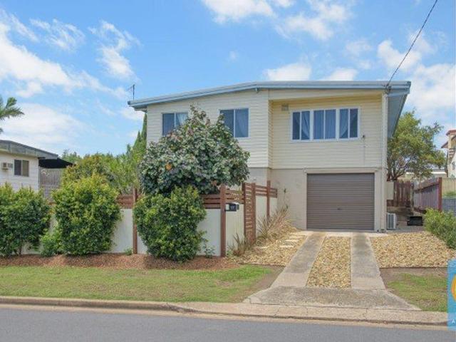 RENOVATED AIR CONDITIONED HIGH SET HOME IN A PERFECT LOCATION