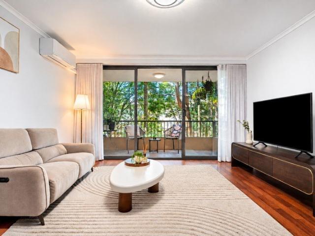 Renovated apartment basks in tranquil rear setting