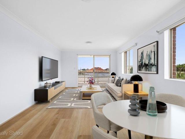 Renovated Apartment Directly Opposite Shops with Spacious Interiors & North Facing Light