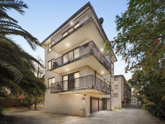 Renovated Apartment with Dual Balconies & Lock Up Garage!