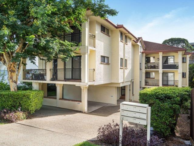 Renovated beauty with dual entertaining areas and lush outlook