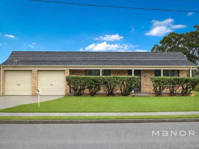RENOVATED BRICK HOME IN PEACEFUL CUL DE SAC SETTING
