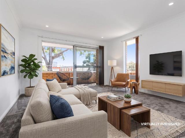 Renovated bright and sunny over sized unit