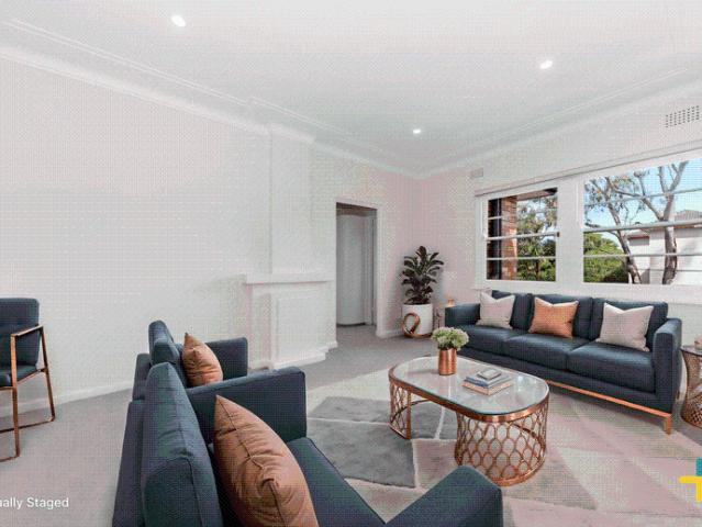 Renovated, Glorious Corner Apartment with Ideal Location