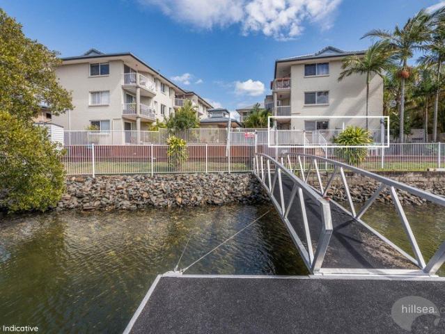 RENOVATED GROUND FLOOR UNIT WITH CANAL & POOL VIEWS