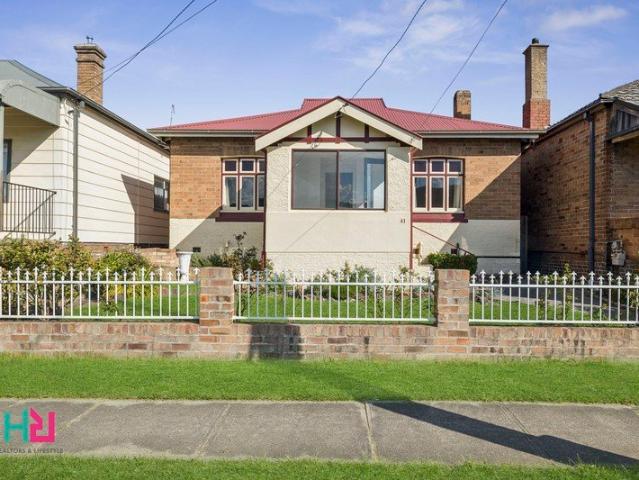 Renovated Double Brick Beauty with Rear Lane Access