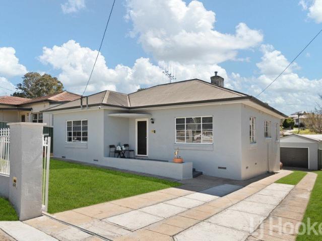 Renovated Double Brick in a Convenient Setting