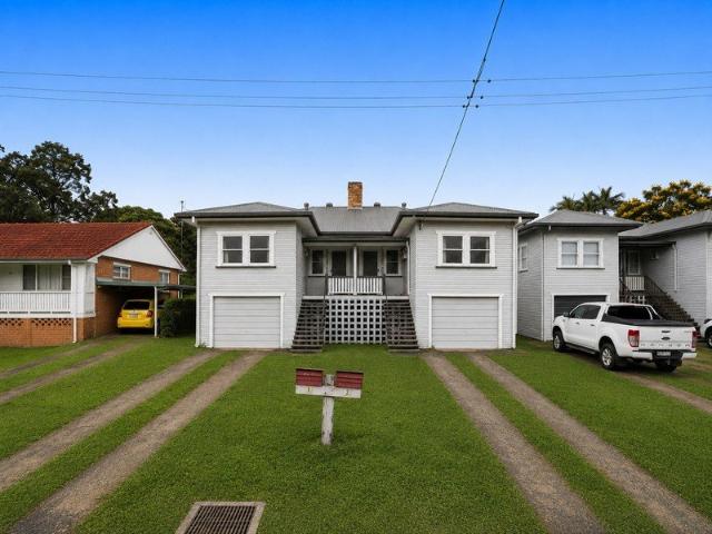 Renovated Duplex Opportunity in Convenient Location
