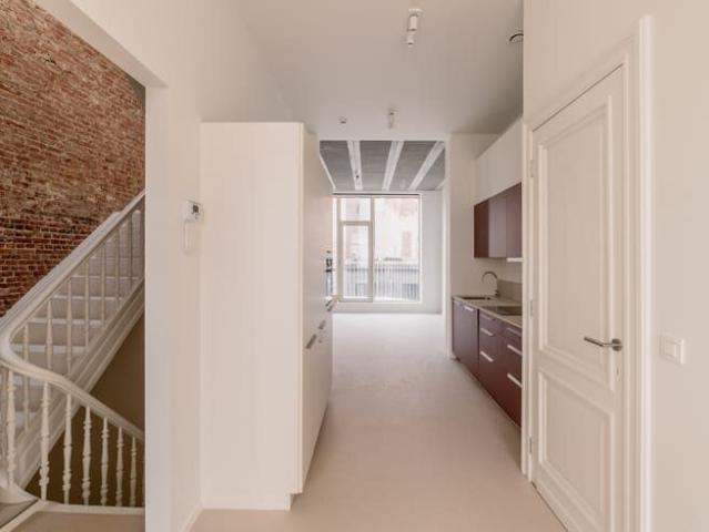 Renovated duplex apartment overlooking a listed monument