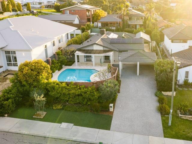 RENOVATED, ELEVATED AND PEACEFUL, THIS IS AN IDEAL FAMILY HOME IN ONE OF CARINE'S MOST SOUGHT AFTER STREETS