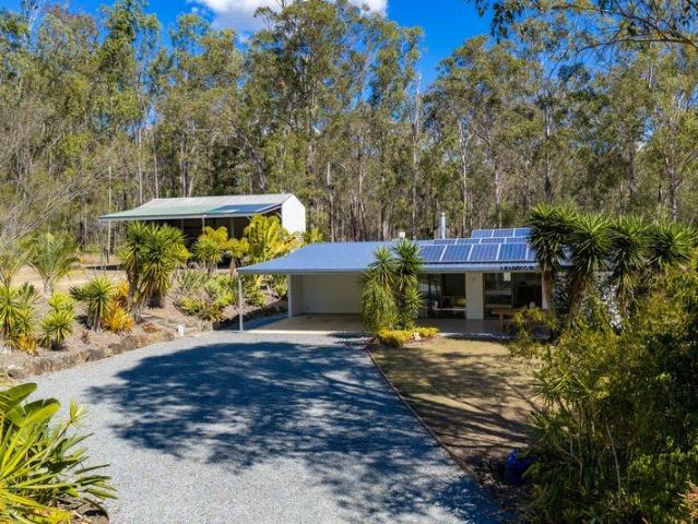 Renovated Family Home on 2.47 Acres with a Tropical Feel