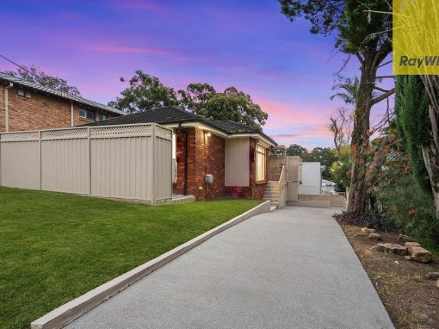 Renovated Family Home with Versatile Lower Level Retreat